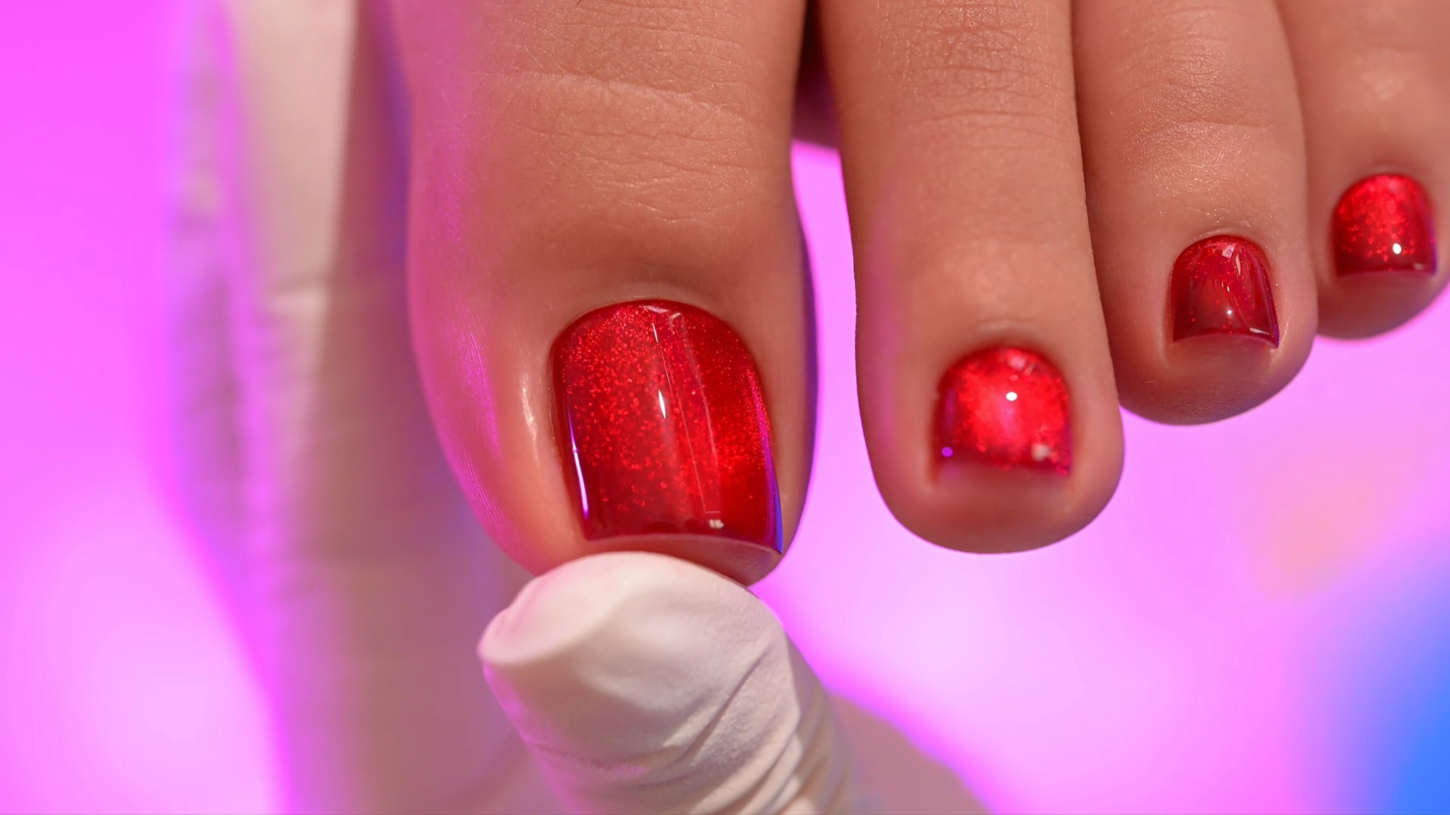 Glossy red gel polish finish