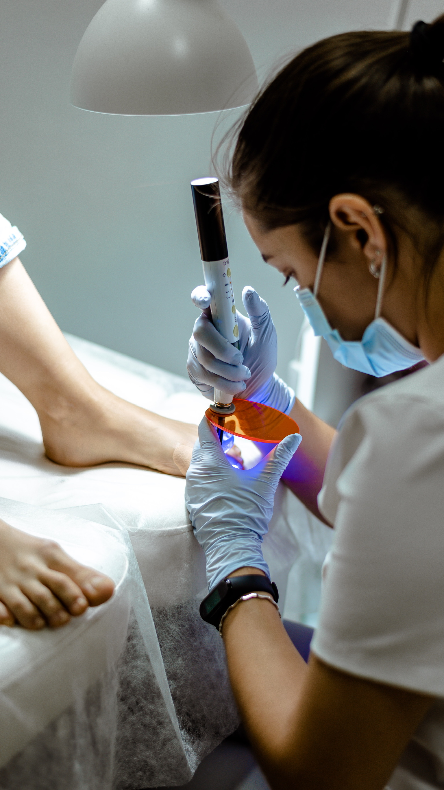 Irene working on a toenail correction application
